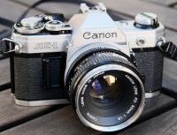 Canon AE-1 and
                Canon EF, history