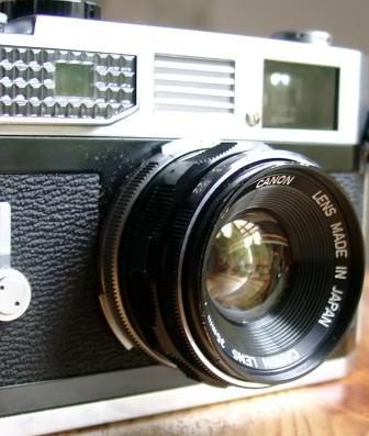 Canon Lens 2.0/35 an einer Canon 7
      Ragefinder